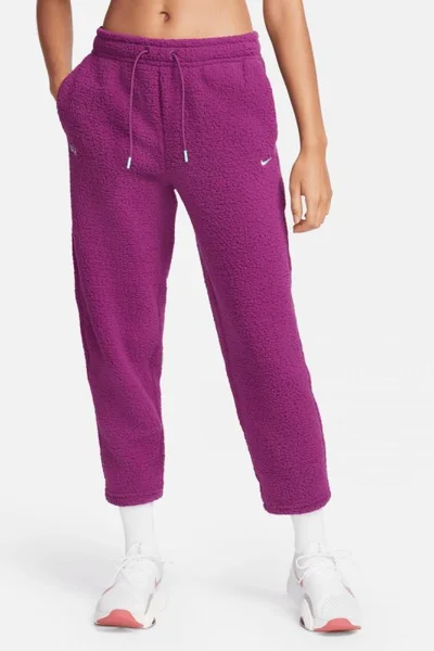 Teplé fialové sportovní kalhoty pro ženy - Nike Therma-FIT