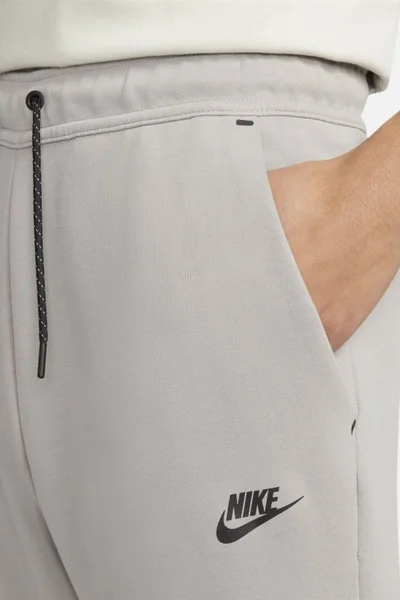 Pánské šedé tepláky DV 016 - Nike