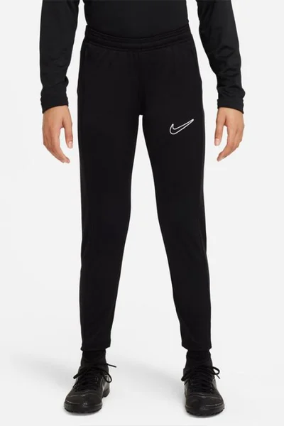 Juniorské kalhoty Nike s bočními kapsami a zipy na nohavicích