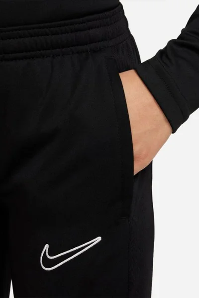 Juniorské kalhoty Nike s bočními kapsami a zipy na nohavicích