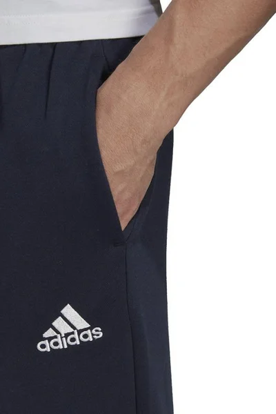 ADIDAS Pánské sportovní kalhoty Essentials Fleece navy blue