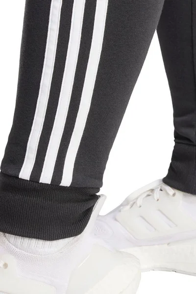 Adidas dámské černé kalhoty Tiro Sweat se zip kapsami