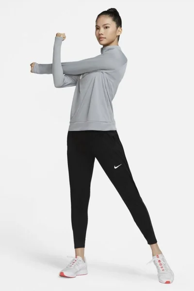 Teplé dámské kalhoty Nike Therma-FIT Essential