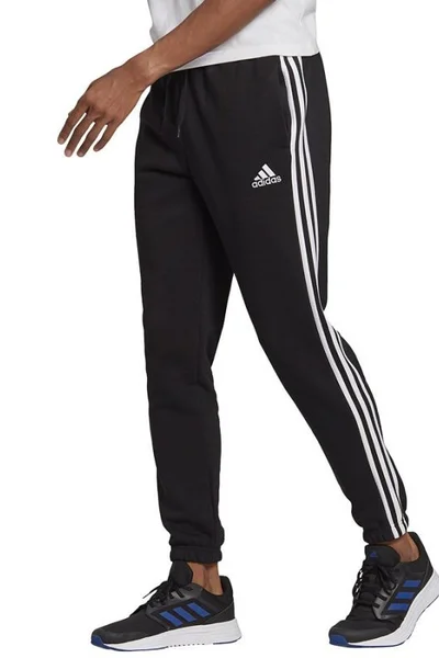 Černé pánské tepláky Adidas Essentials Tapered Elasticcuff 3 Stripes Pant M GK8822