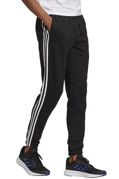 Černé pánské tepláky Adidas Essentials Tapered Elasticcuff 3 Stripes Pant M GK8822