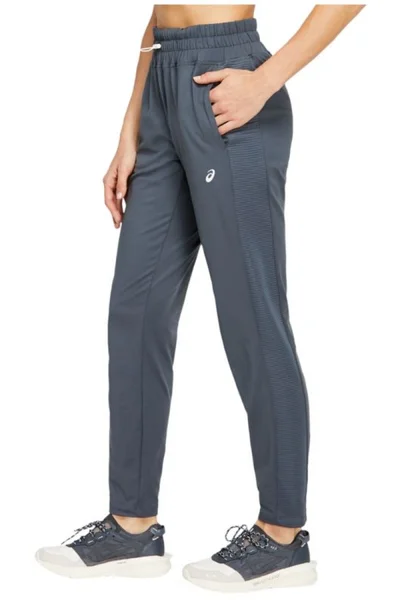 Šedé dámské kalhoty Asics Thermopolis Fleece Taper Pant W 2032B513-083