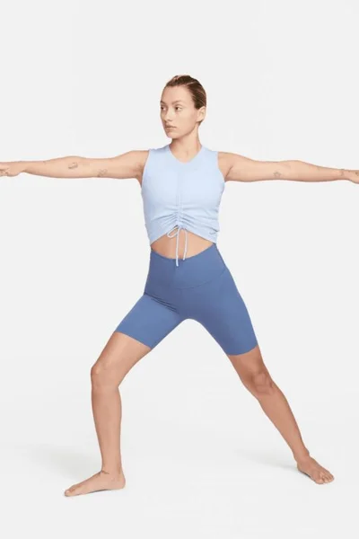 Průhledné modré tílko Nike Yoga s technologií Dri-FIT