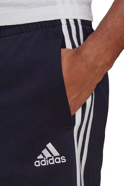 Námořnicky modré pánské šortky adidas s bílými detaily