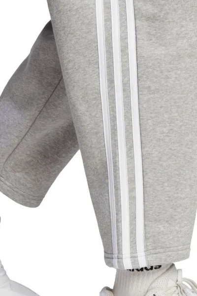 Dámské fleecové kalhoty adidas Essentials s 3 pruhy