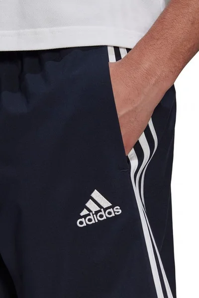 Tmavomodré tréninkové šortky adidas Aerore Essentials s pruhy