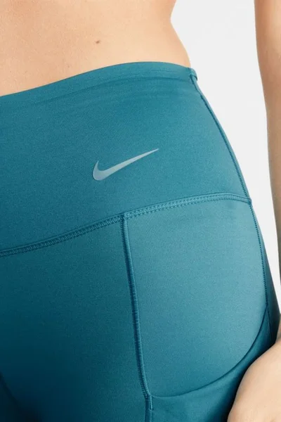 Dámské legíny Nike s kapsami a technologií Dri-FIT