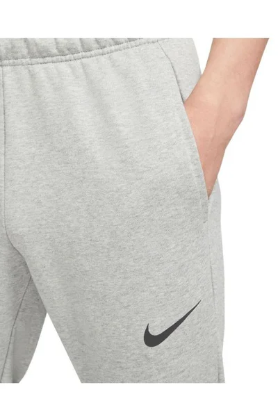 Sportovní kalhoty Nike Dri-Fit Trapered M šedé