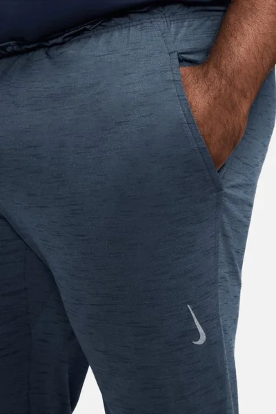 Pánské tmavě modré  kalhoty Yoga Dri-FIT Nike